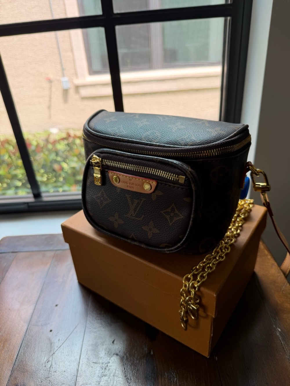 Louis Vuitton Brown Monogram Crossbody Bag with Gold Hardware and Chain
COPY